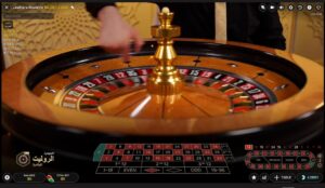 croupier spins the wheel